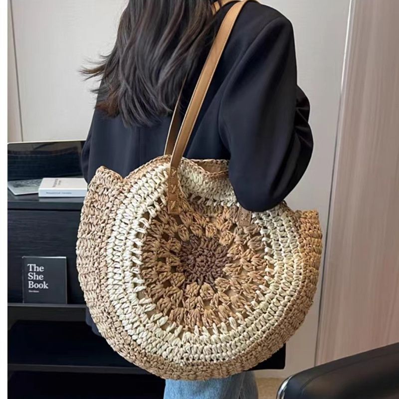 Borsa da donna rotonda in paglia cava intrecciata a mano con tracolla in rafia in rattan Borsa tote grande estiva bohémien_voghion.com