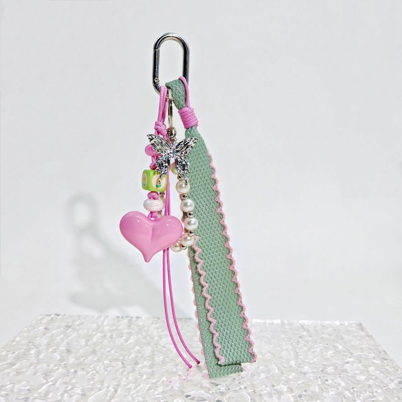 Ciondolo per borsa a forma di cuore con catena di perle, portachiavi, cinturino intrecciato, corda intrecciata_voghion.com
