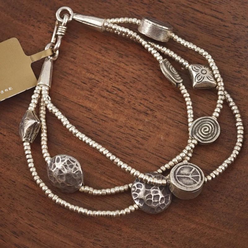 Braccialetto di perline a barilotto in corda di cera cubana vintage intrecciata in argento puro fatto a mano a Chiang Mai, Thailandia_voghion.com