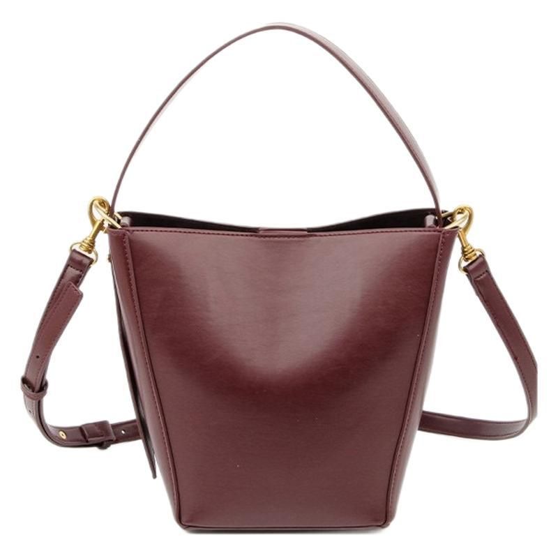 Borse da donna alla moda e versatili, con una borsa a tracolla e una borsa a tracolla, un design di nicchia, una borsa a secchiello e una borsa a mano_voghion.com