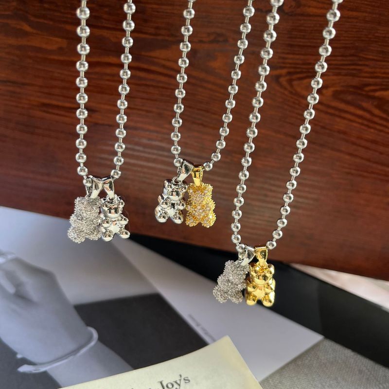 Collana con ciondolo a forma di orso con zircone intarsiato micro in titanio, design di nicchia, moda, collana versatile, catena per maglione_voghion.com