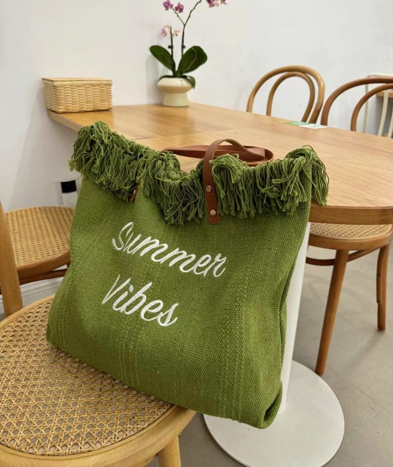 Neue Strand-Reisehandtasche, modisch, einfache Quaste, große Kapazität, Umhängetasche für Mama, neue Flut_voghion.com