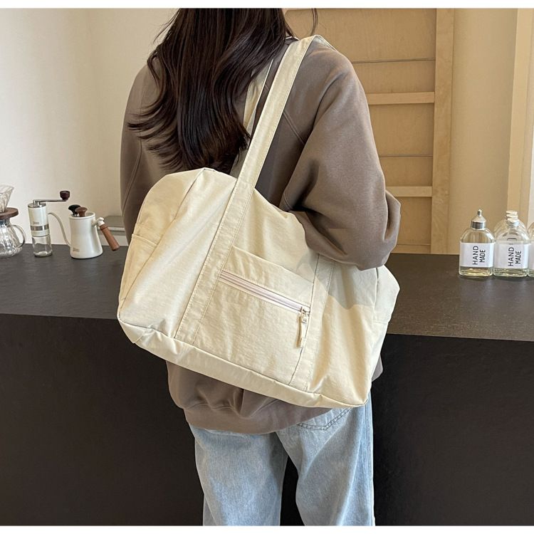 Korean version nylon lightweight and large capacity waterproof hand-held tote travel shoulder commuting cloth bag,_voghion.com
