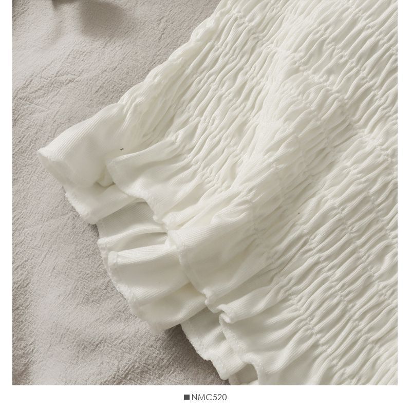 Canotta in pizzo plissettato francese primaverile ed estivo con cuscino da donna, indossata come base, bella schiena e petto avvolti_voghion.com