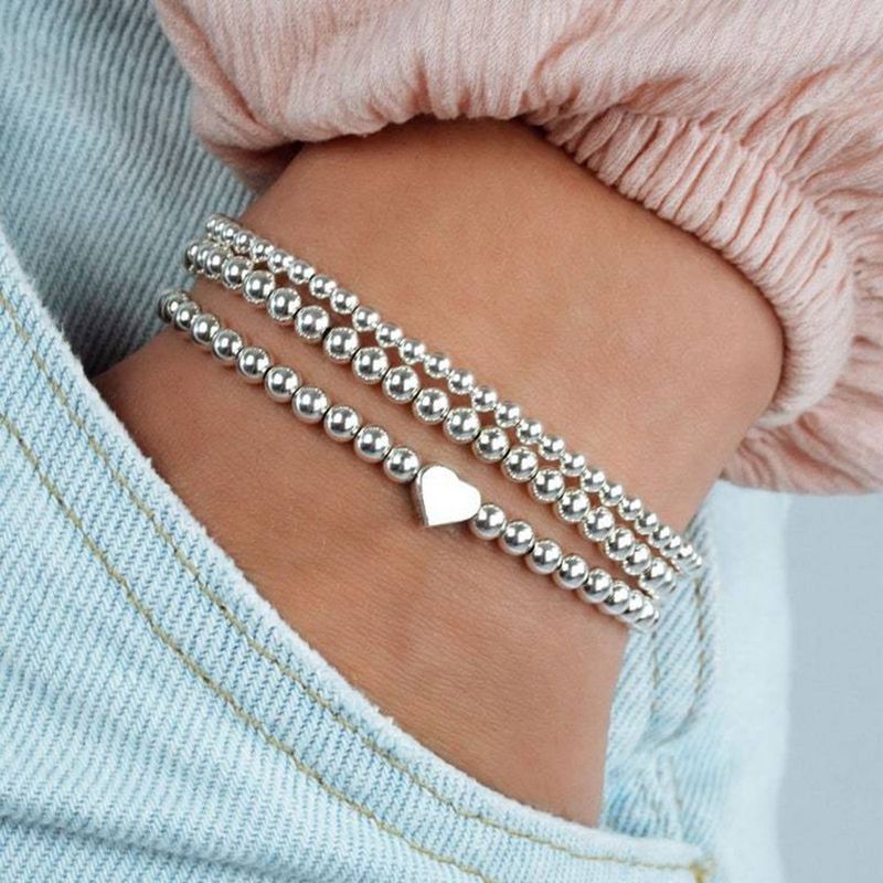 Braccialetto da donna con perline in rame e argento galvanizzato, bracciale elastico a forma di cuore, gioielli coordinati per le mani_voghion.com