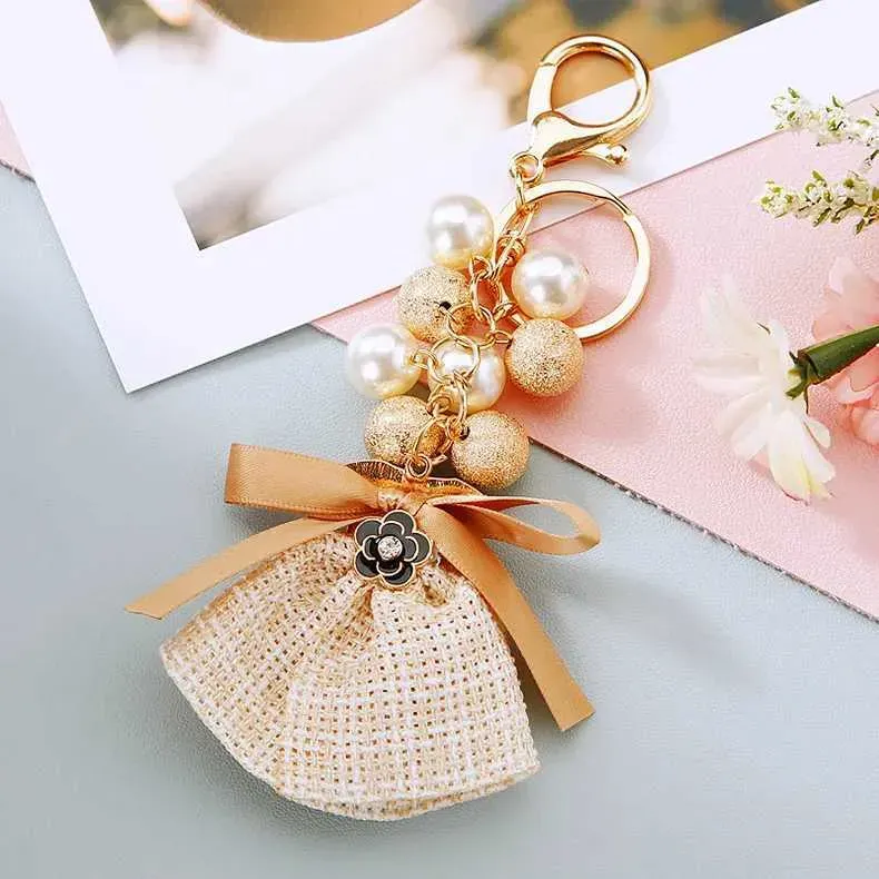 Bijou tendance de luxe, nœud papillon, perle, porte-clés pendentif mignon pour femme, cadeau créatif Y250418_voghion.com