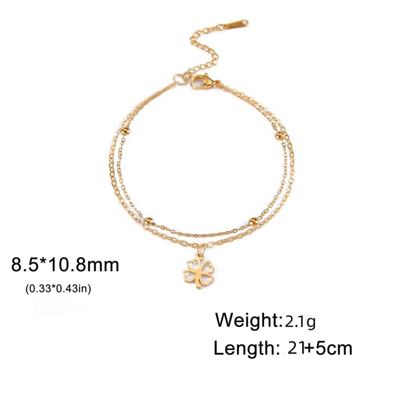 Cavigliera in acciaio inossidabile con ciondolo a forma di quadrifoglio cavo tagliato in titanio, regalo per donna alla moda_voghion.com