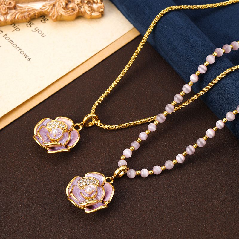 Collana di perline di pietra occhio di gatto con fiore di camelia smaltata maglione autunnale e invernale leggero lusso nicchia sensazione di alta qualità_voghion.com