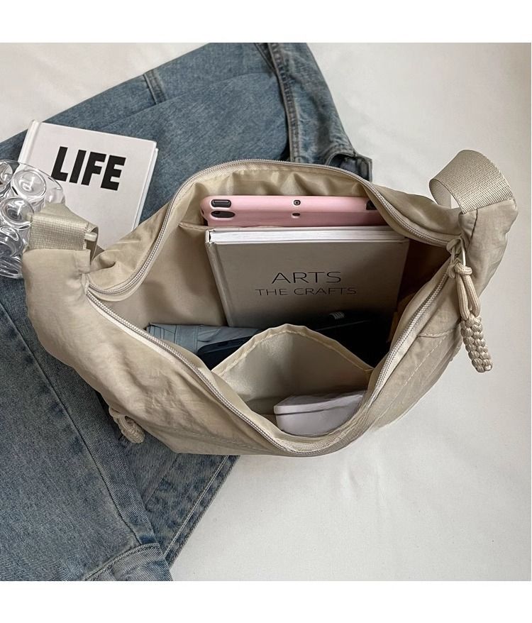 2025 Women's Textured Dumpling-Shaped Multifunctional Crossbody Bag_voghion.com