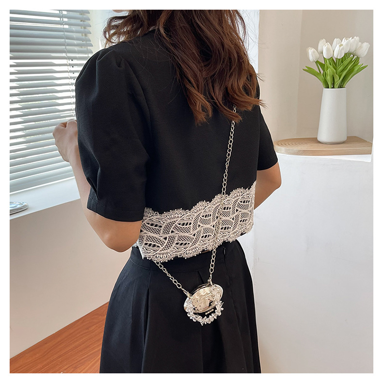 Mini 2024 Été Nouveau sac en coquille d'œuf en métal Sac de banquet de mode européenne et américaine Sac à bandoulière à bandoulière unique Sac pour femmes élégant_voghion.com
