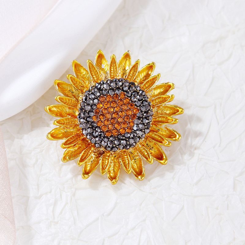 New enamel sunflower brooch women's diamond inlaid plant chest flower fashionable alloy high-end jewelry_voghion.com
