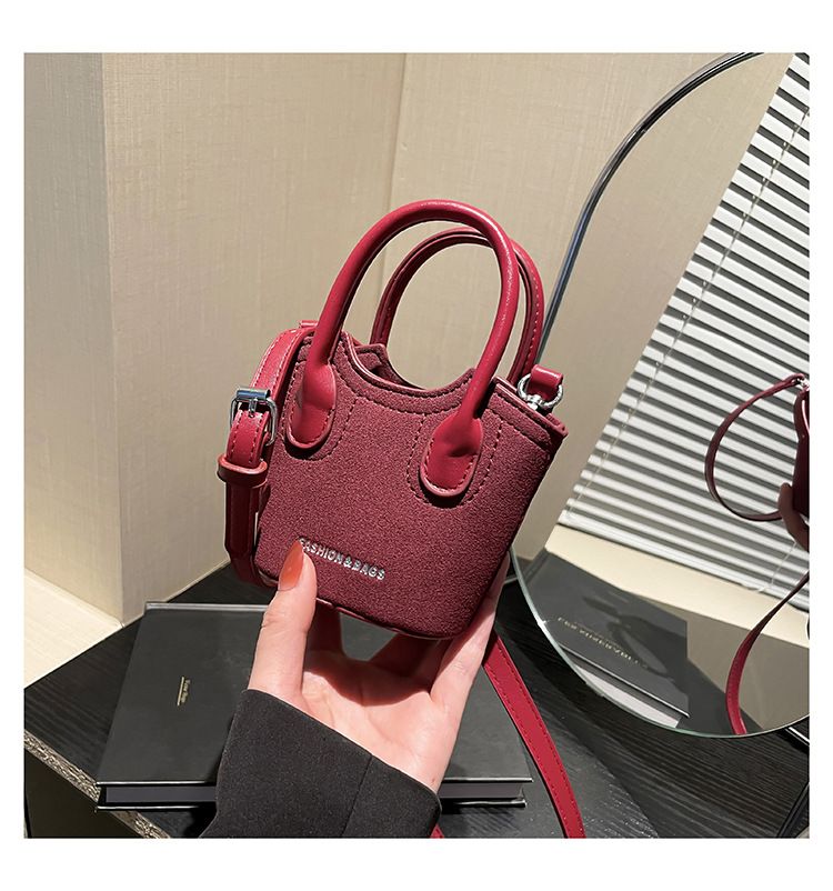 Borsa a secchiello da donna, alla moda, con tracolla monospalla, stile Candy Lover, con rossetto, da portare a spalla, rossa_voghion.com