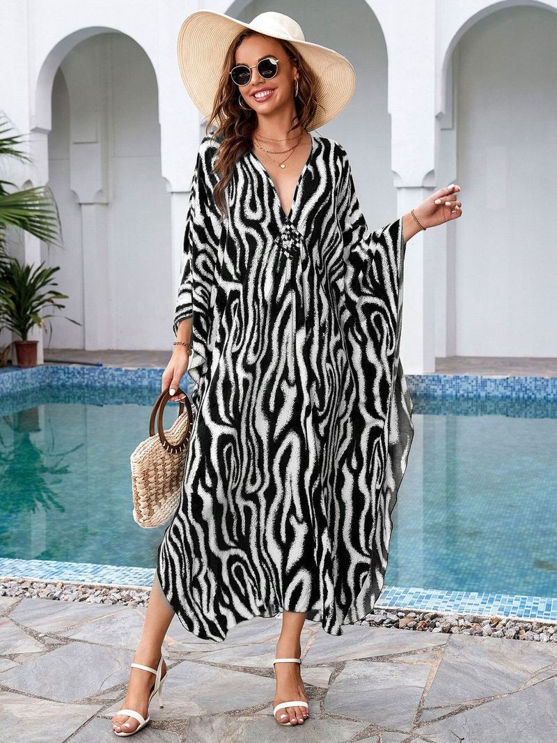 „Strandkleid mit Bohemian-Print – Fließendes langes Kleid für Pool und Urlaub“_voghion.com