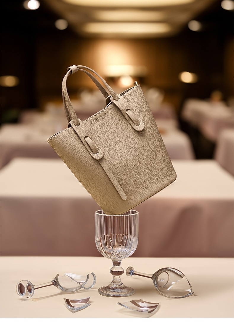 Nuova borsa a secchiello portatile alla moda in morbida pelle bovina con borsa a tracolla singola a spalla di alta qualità Borsa minimalista in pelle bovina con strato superiore per le donne_voghion.com