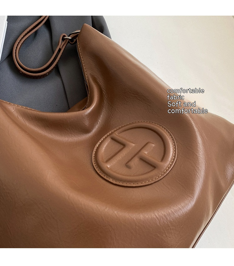 2024 Light Luxury Creative Women's New Cool And Trendy Saddle Bag Fashion Large Capacity Shoulder Bag Solid Color Handbag_voghion.com