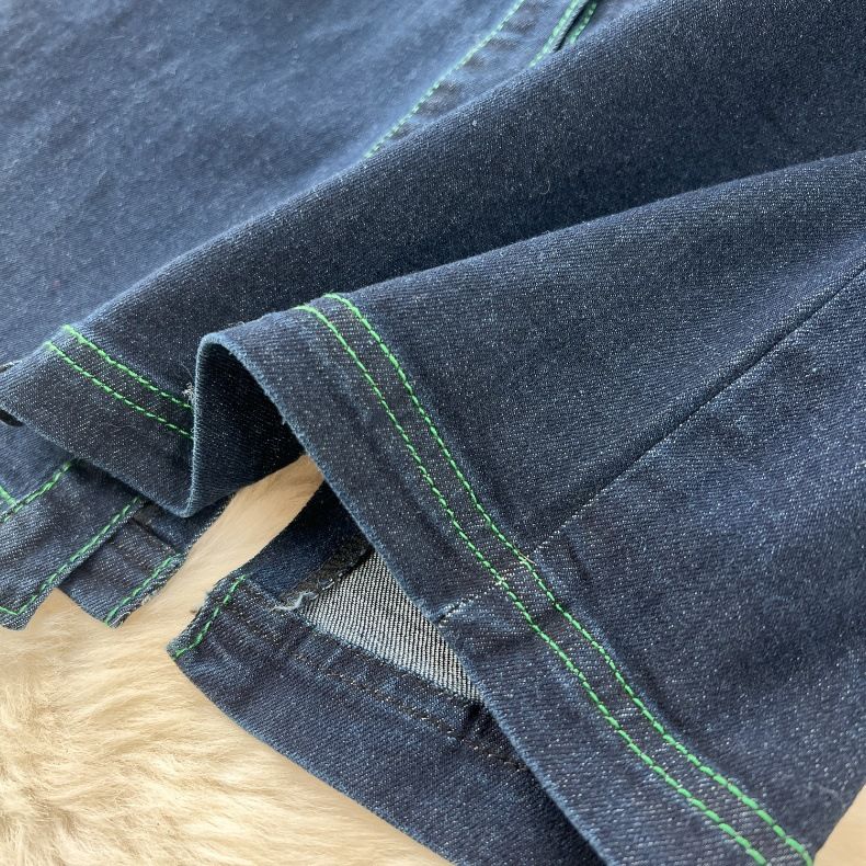 Abito da donna in denim con design anti-età, linea a vista, abbottonato, vestibilità slim, di media lunghezza e con spacco_voghion.com