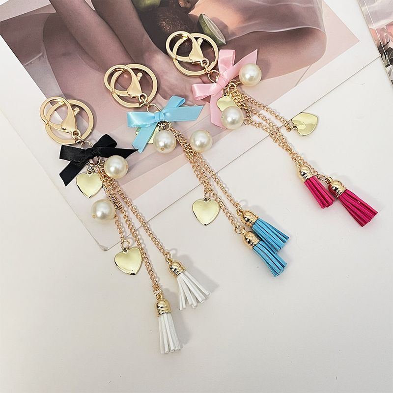 Neue exquisite Bowknot Quaste Herz Auto Schlüsselanhänger Telefon Fall Tasche Anhänger kleine Geschenk Dekoration_voghion.com