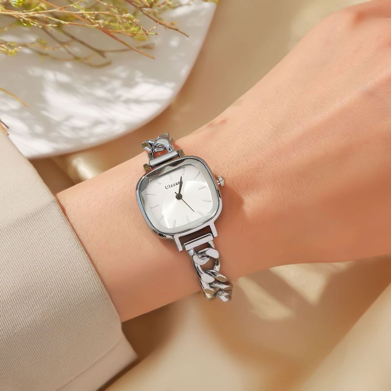 Dameur og smykkesæt med lilla Aurora-urskive og firkantet armbåndsur + armbåndssæt med sommerfuglesten til studerende_voghion.com