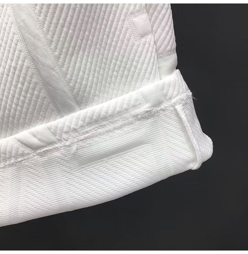 Pantalones cortos de cinco puntos con dibujos animados bordados para hombre, verano 2023, nuevos pantalones cortos casuales versátiles, modernos y sanitarios_voghion.com