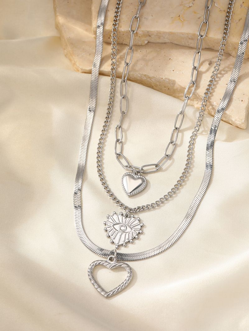 Collana in acciaio inossidabile vintage con trama nobile, ciondolo a forma di cuore unico, catena multi-stile, collana raffinata per donna, gioielli da indossare durante le feste_voghion.com