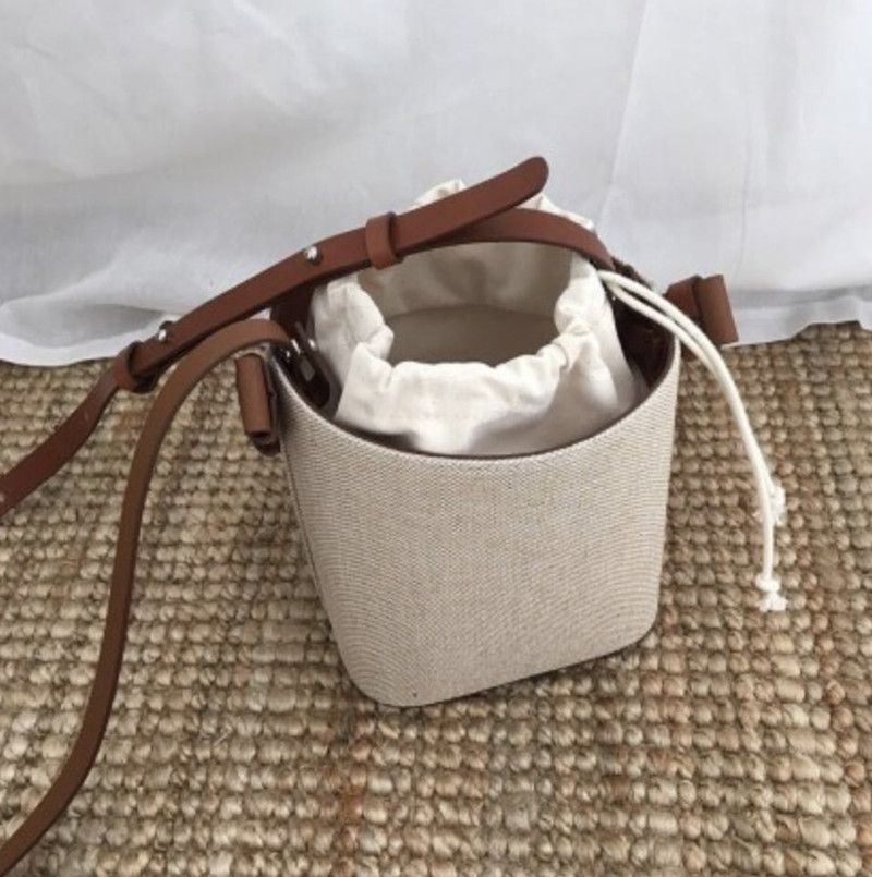 2024 Wiosna/lato Nowy Instagram Popularny Panel płócienny Skórzana torba typu wiadro Kontrast Mała torba Jedno ramię Crossbody Damska torba_voghion.com