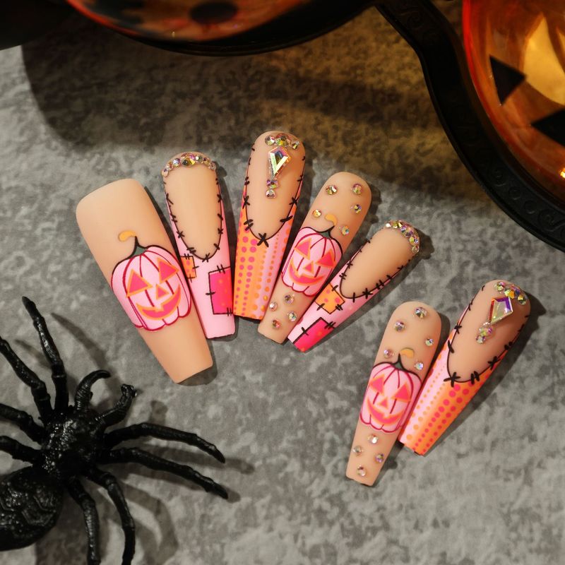 Indossa un'armatura, smalto a pois con diamanti e acqua di zucca francese rosa satinato di Halloween, smalto finito_voghion.com