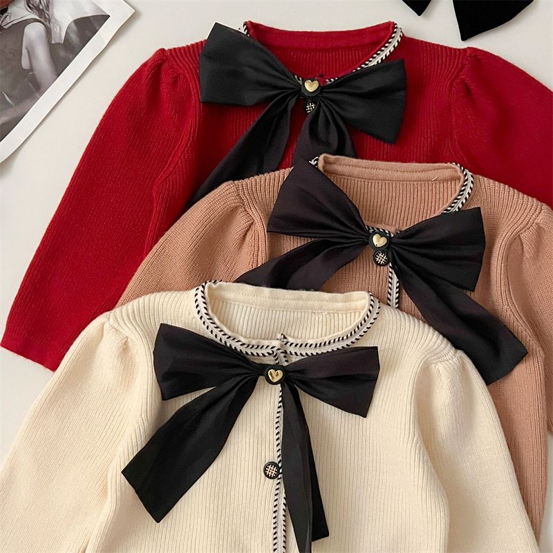 Vestito in maglia per ragazze autunno e inverno, versione coreana, con fiocco in maglia e maniche a sbuffo_voghion.com