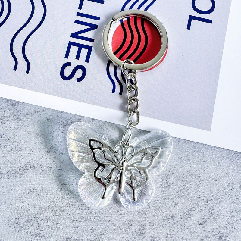 2025 Nuovo portachiavi a forma di farfalla in resina, squisita personalità, creativo, zaino, custodia per auricolari, ciondolo per auto, regalo semplice_voghion.com