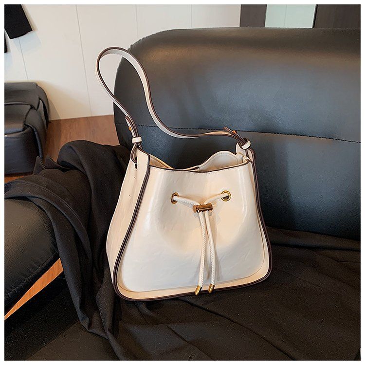 Eimer 2025 Sommer Neue Handtasche PU Kordelzug Modetrend Koreanische Pendler Nische High-End-Tasche_voghion.com