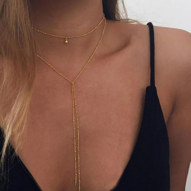 Gargantilla de cadena sencilla de color dorado y plateado para mujer, collar con borlas y cuentas largas, moda 2024_voghion.com