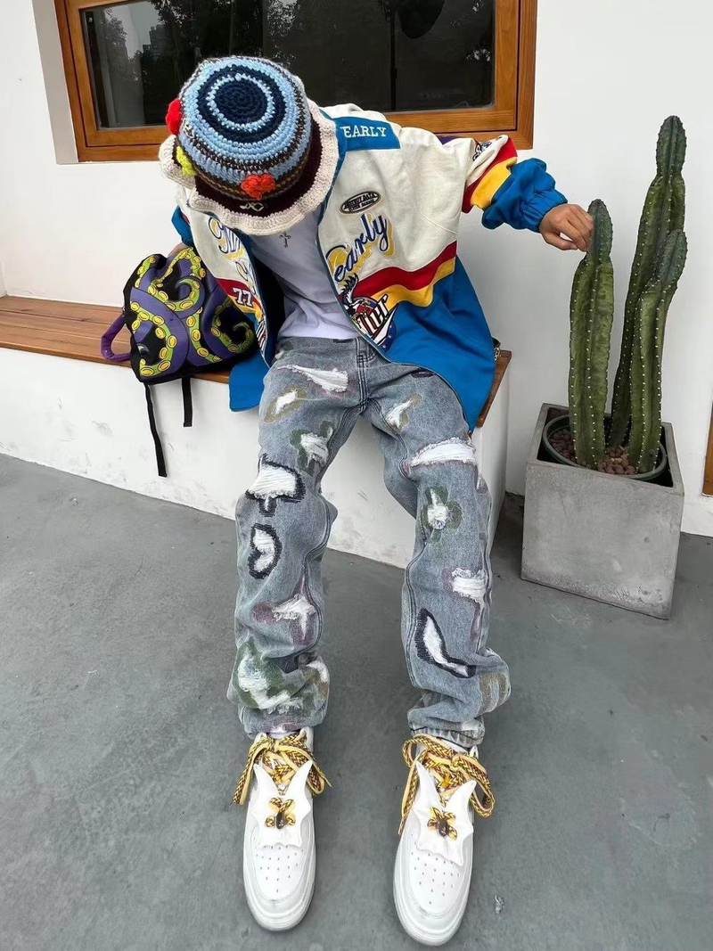 Men's Clothing American Heavy Industry Splicing Knife Cut Holes And Erosion Patch Jeans High Street Hip Hop Loose Straight Micro Flare Pants_voghion.com