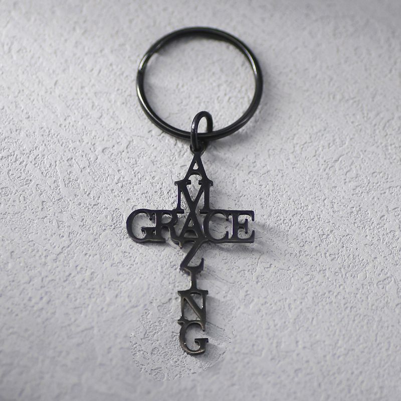 Bogstavet "AMAZING GRACE" kryds i troens navn nøglering herremode enkel nøglering_voghion.com