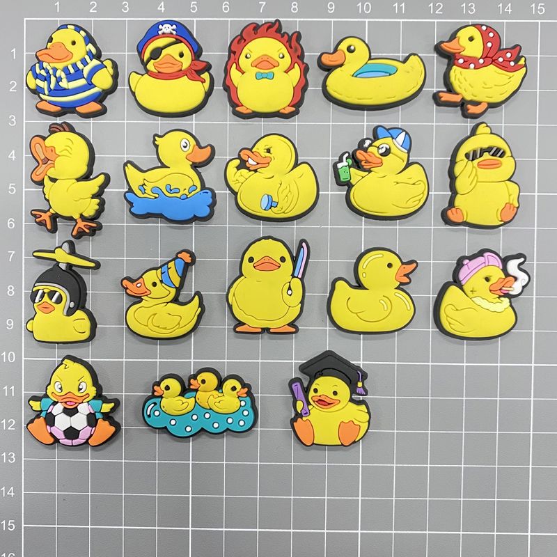 Neue gelbe Ente niedlichen Cartoon Schuhe Blume Schuh Schnalle weiche Gummi Schuhe Zubehör Ornamente Sandalen Zubehör_voghion.com