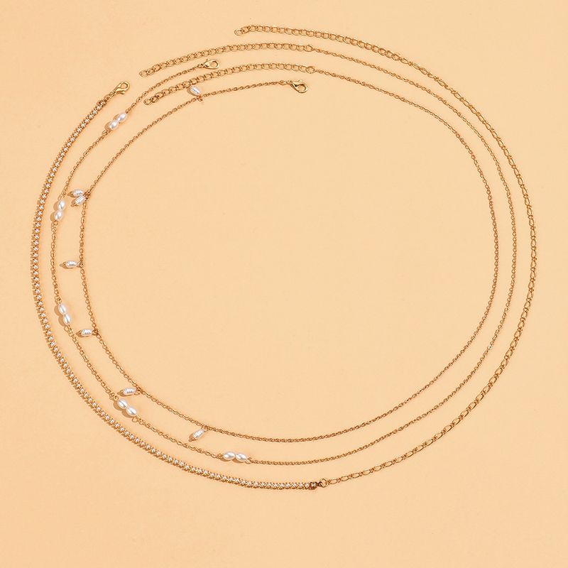 DZ0360 Chaîne de taille simple en perles de riz pour femme, style pastoral créatif_voghion.com