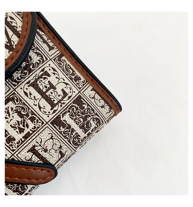 European and American retro wallet ladies long large capacity D buckle multi card slot multi function tri fold clutch short card holder_voghion.com