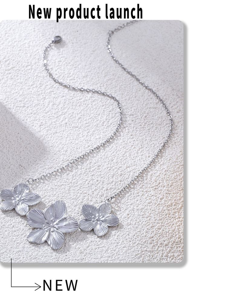 Sieradenset voor dames, gouden bloemenring, ketting en armband, roestvrij staal, PVD-geplateerd, echt goud, kleurbehoud sieraden_voghion.com