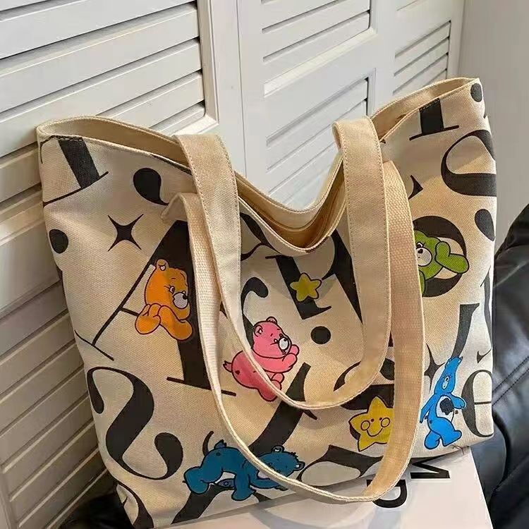 Női táskák Diák vászon táska Nagy kapacitású bevásárlótáska Ingázó új stílusú táska Sokoldalú nyomtatás Anyuci alkalmi kézi bevásárlótáska_voghion.com