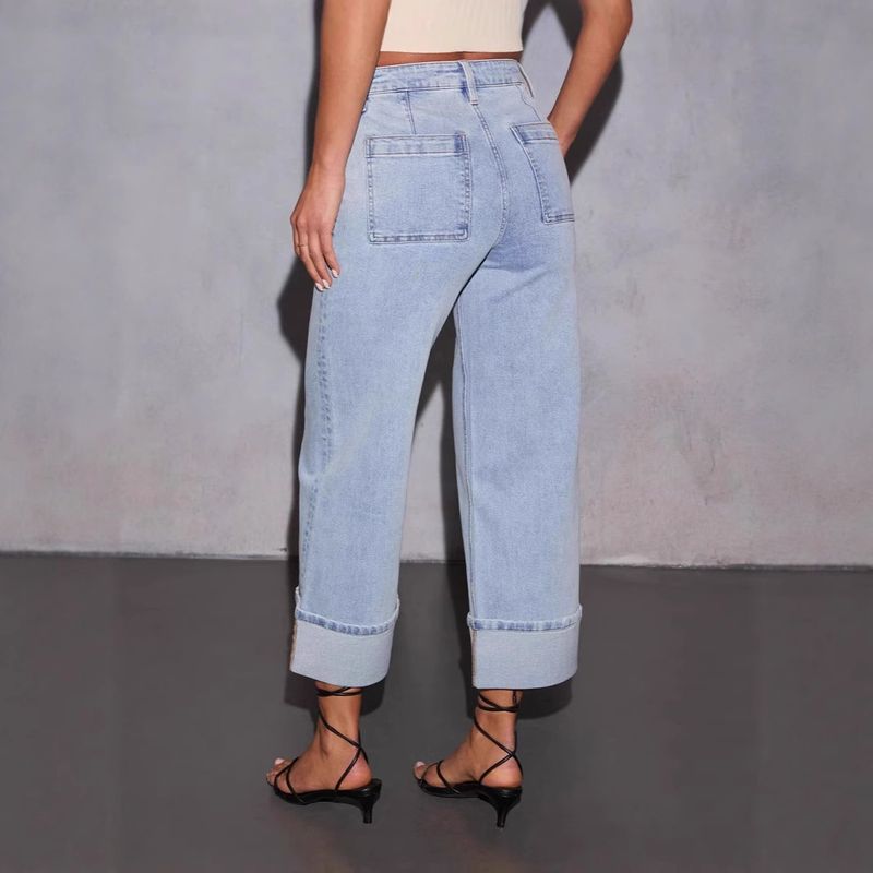 Jeans elasticizzati a vita alta e gamba larga da donna: pantaloni in denim comodi ed eleganti con effetto slavato, perfetti per abbigliamento casual e da ufficio._voghion.com