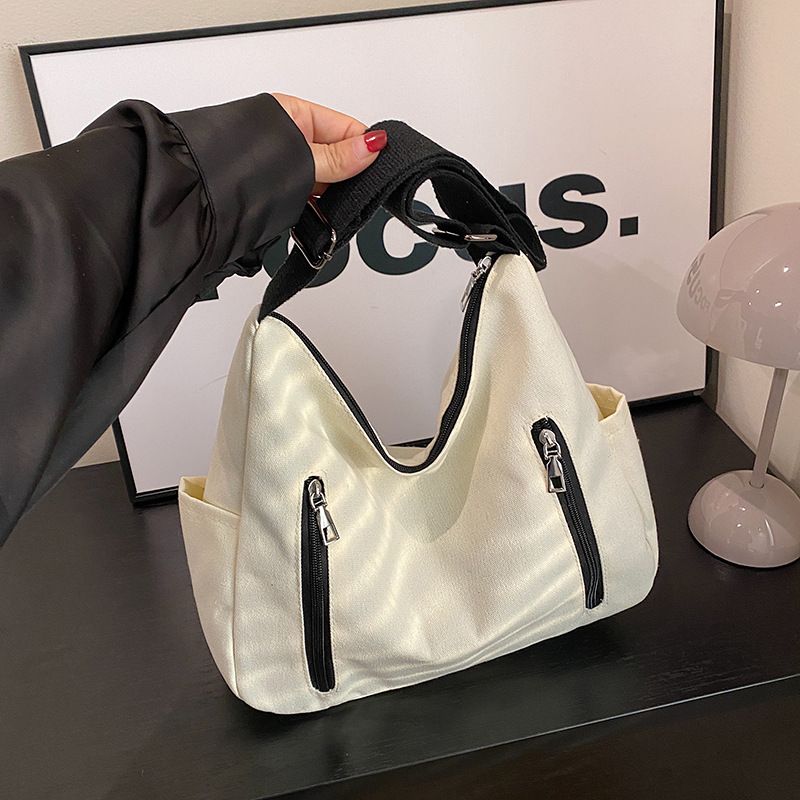 Borse alla moda di quest'anno per le donne, grande capacità, 2024, nuova borsa a tracolla versatile in tinta unita con texture a secchiello_voghion.com