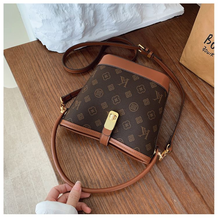 Tendenza di quest'anno: borsa a secchiello leggera e lussuosa stampata per le donne, nuova borsa alla moda 2025, borsa a tracolla versatile_voghion.com