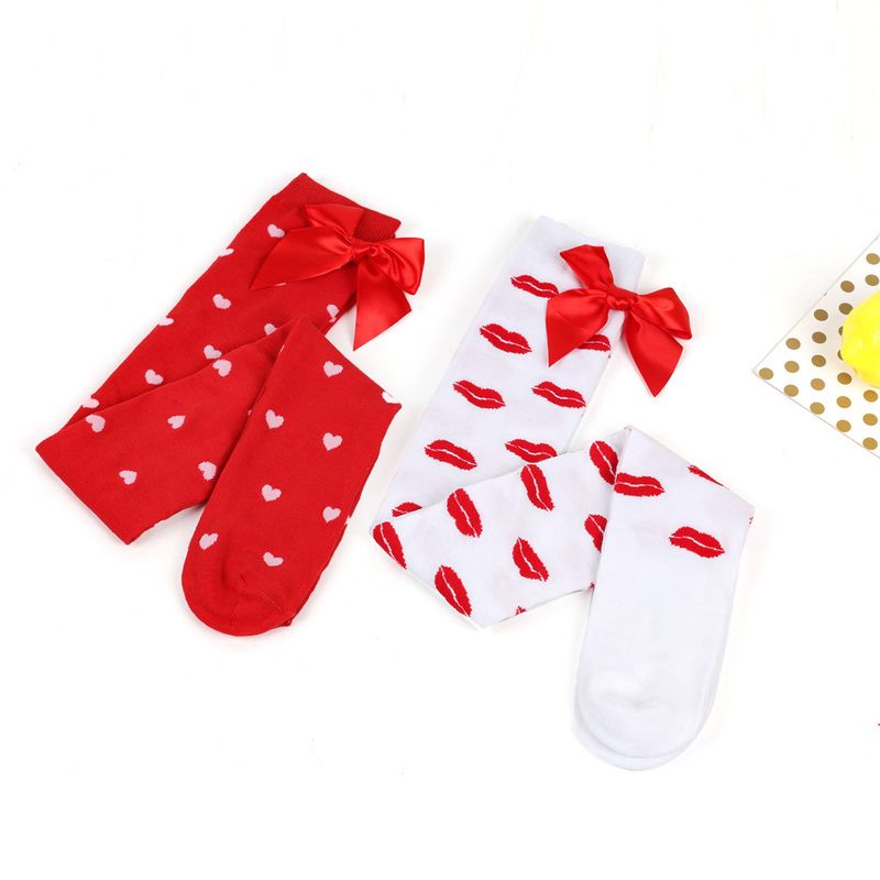 Le calze Red Lips Love per San Valentino saranno calze sopra il ginocchio e graziose calze con fiocco_voghion.com