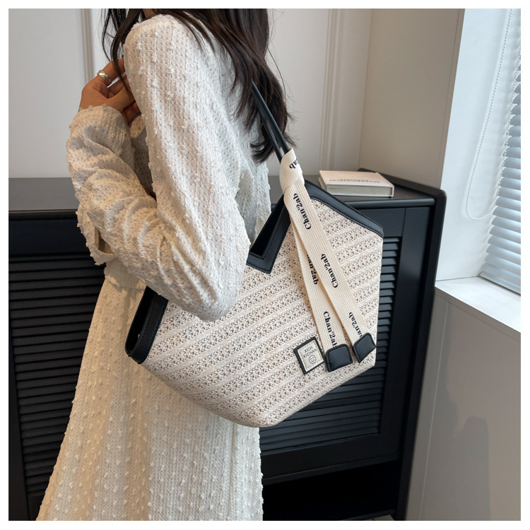 Woven Straw Bag Women's Large Capacity 2023 New Summer Versatile Shoulder Bag Texture Popular Commuter Tote Bag_voghion.com