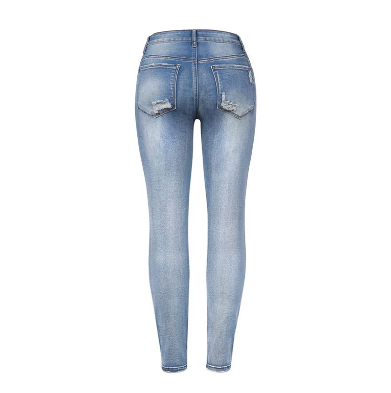 Schmale, zerrissene Jeanshose mit hohem Stretchanteil für Damen_voghion.com