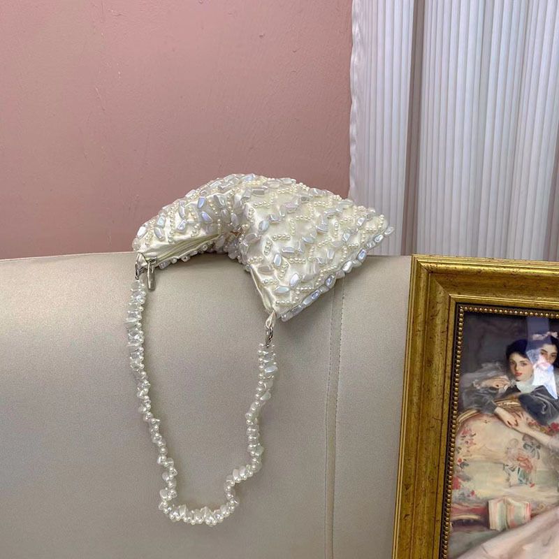 Borsa di lusso leggera con design a nicchia irregolare perlato sotto le ascelle, elegante e dal temperamento francese_voghion.com