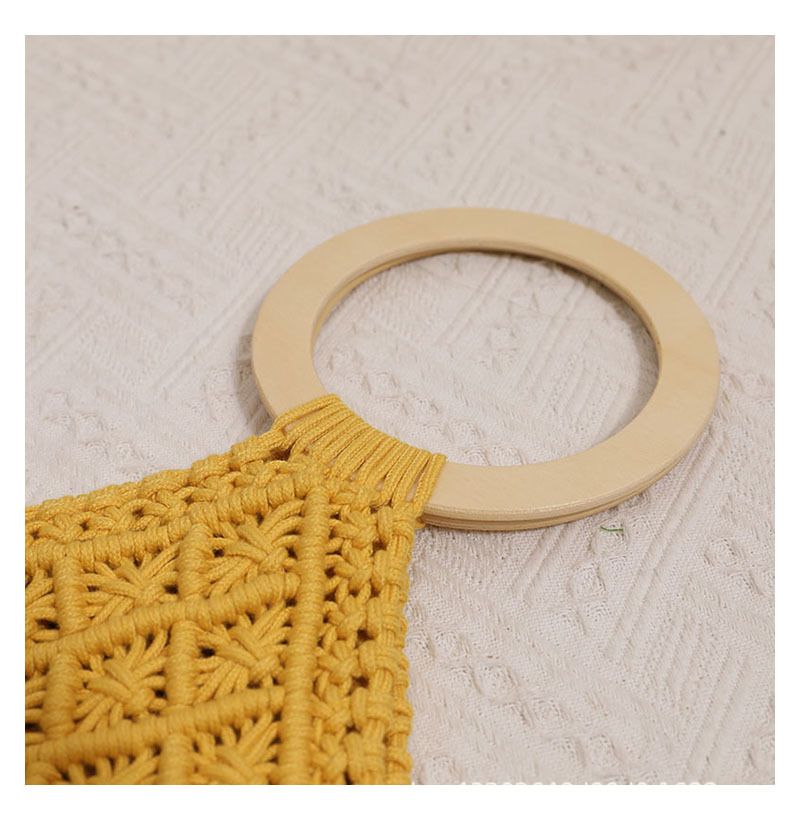 Borsa intrecciata in corda di cotone cava con manico in legno di vendita calda transfrontaliera, nuova borsa intrecciata in paglia con nappa lunga, borsa da spiaggia per le vacanze al mare_voghion.com