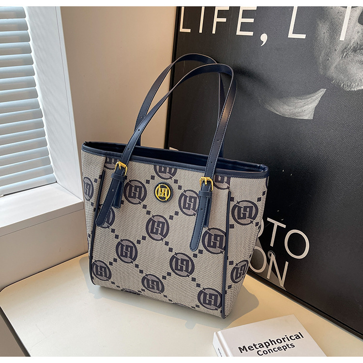 2023 Neue, heiß verkaufte Jacquard-Premium-Einkaufstasche für Damen mit großer Kapazität, ausgehende Handtasche, vielseitige, temperamentvolle Umhängetasche für Damen_voghion.com