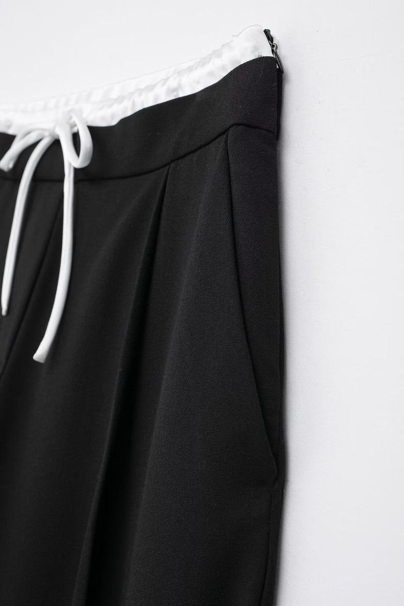 Pantaloni a gamba larga a doppio strato in stile casual, primavera 2024 da donna_voghion.com