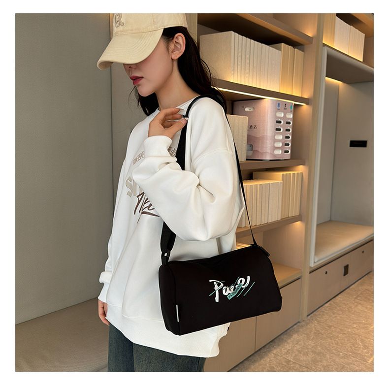 2024 New Casual Shoulder Women's Oxford Cloth Large Capacity Lightweight Pillow Black Minimalist Printed Crossbody Bag_voghion.com
