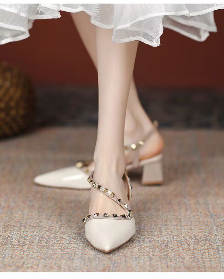 Women's 2025 Summer New Rivet High End Niche French Pointed Toe Thick Heel High Heels_voghion.com