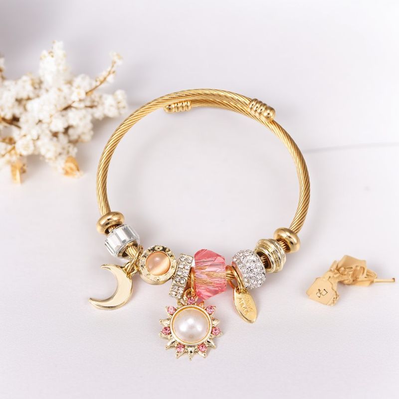 Bracciale fai da te in acciaio inossidabile al titanio con corona a forma di cuore dorato, margherita, stella e sole_voghion.com